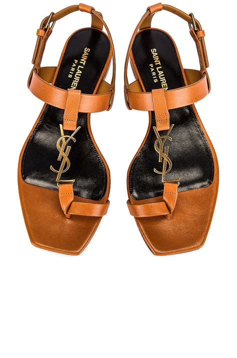 ysl tribute sandal flat|saint laurent cassandra flat sandals.